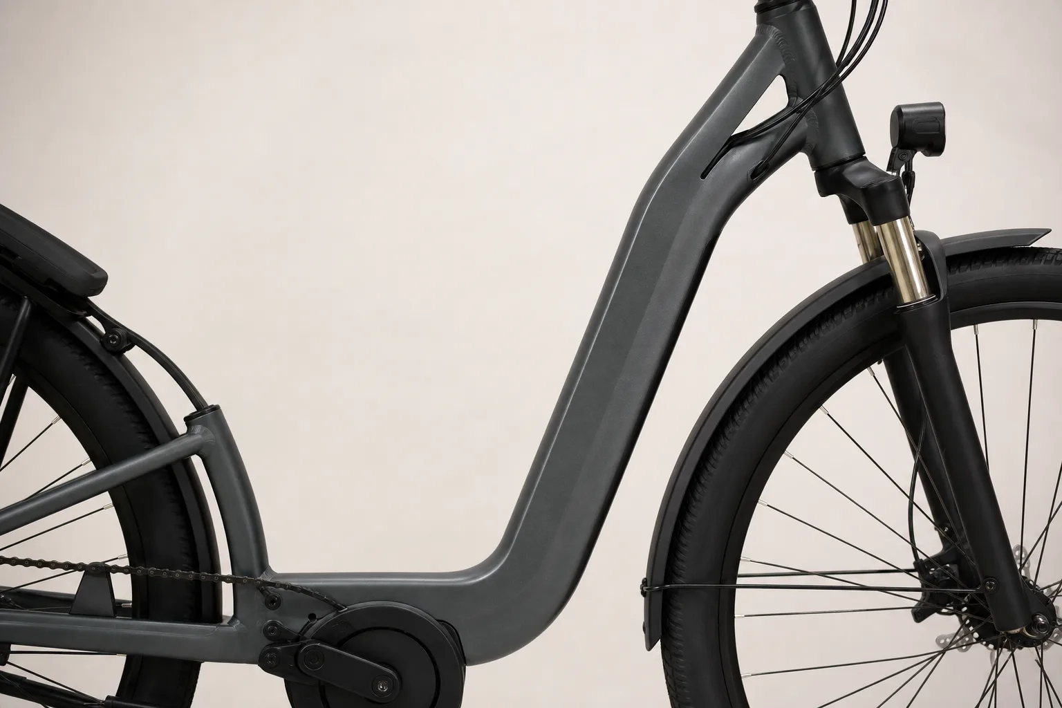 Stiff hip, loaded rack, city traffic. What a low frame actually buys you